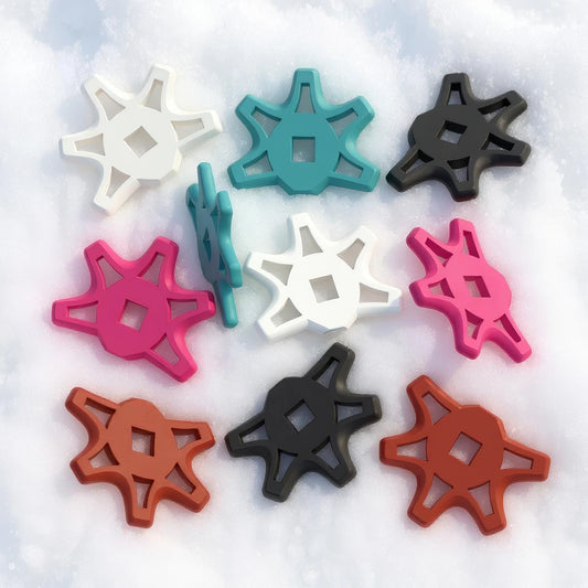 Übersicht von GUZZLY wechselbaren Tiefschneetellern in Schnee